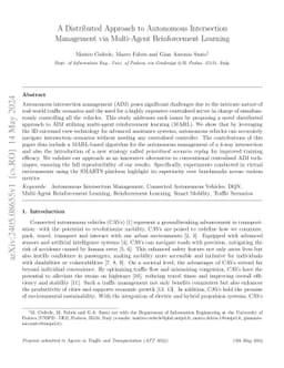 A Distributed Approach to Autonomous Intersection Management via
  Multi-Agent Reinforcement Learning